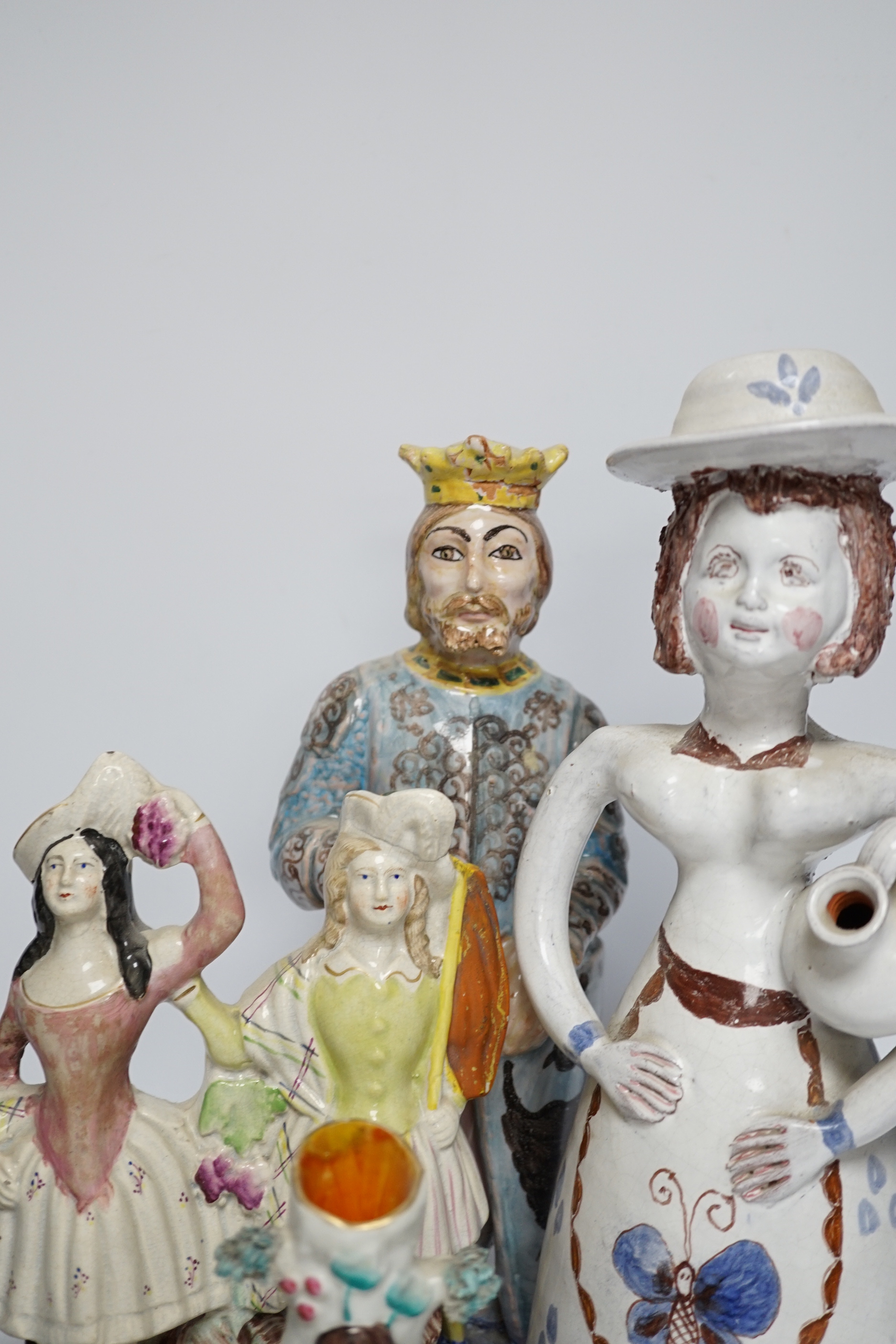 A Maiolica figure of a king and 4 other items including Staffordshire